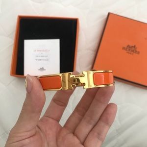 Hermes “Le Bracelet H” orange/gold bracelet